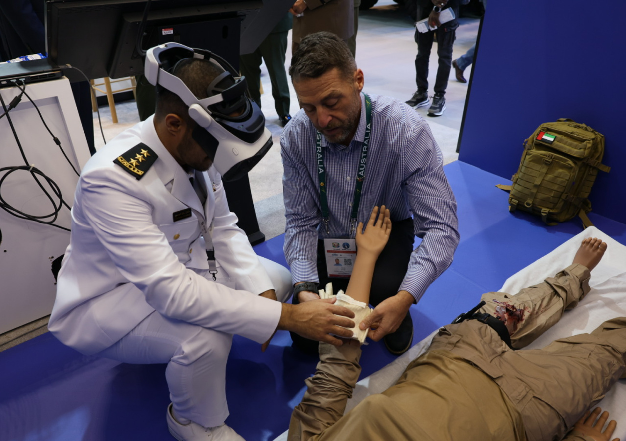 Man showing man in military uniform mixed reality technology