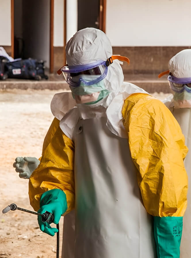 Worker in hazmat suit