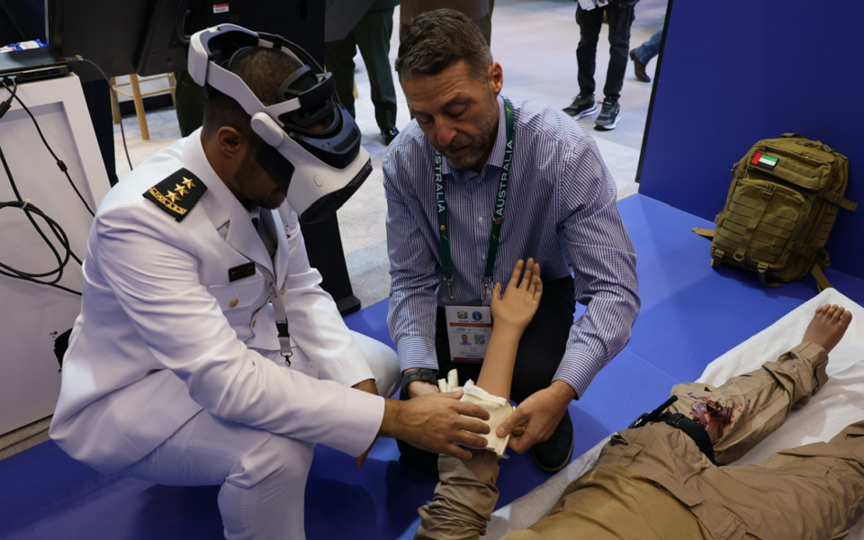 Image of a BlueRoom team demonstrating the MR technology on a dummy.