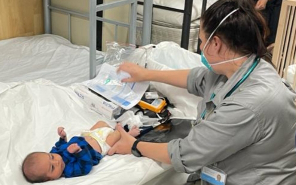 Photo of a baby born at the Aspen Medical clinic, tended to by one of our clinicians.