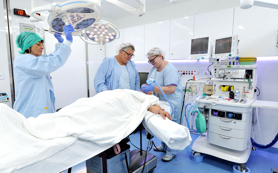Photo of a surgery underway in Aspen Medical's mobile health unit.