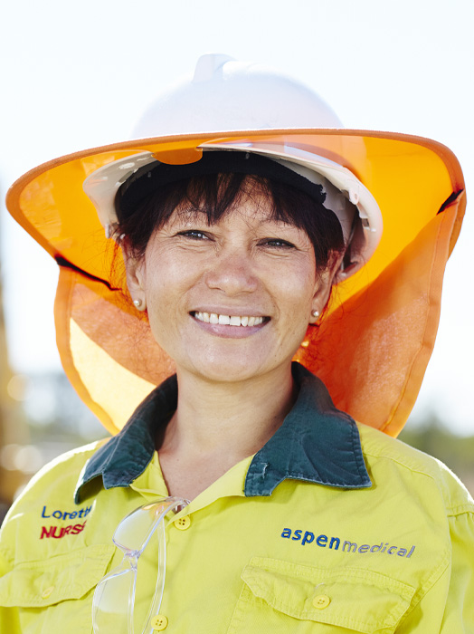 Photo shows an Aspen Medical clinician on an oil and gas site.