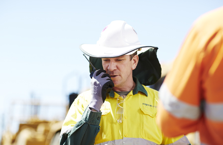 Photo shows a male Aspen Medical clinician on an oil and gas client site.