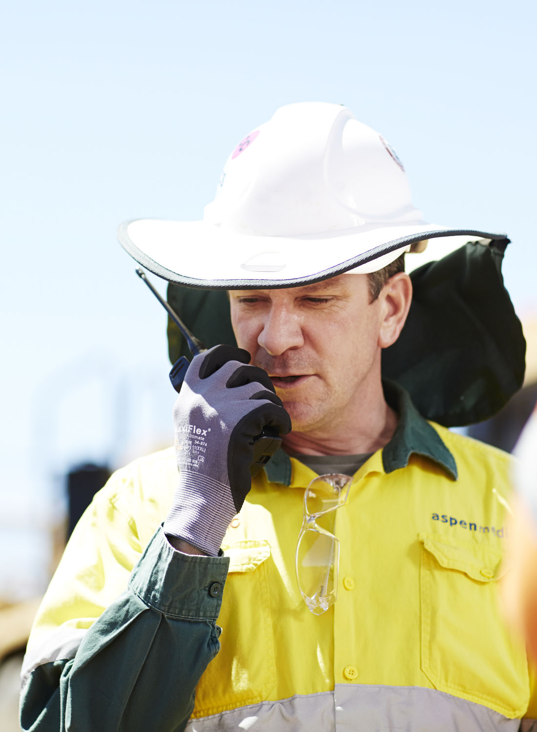 Photo shows a male Aspen Medical clinician on an oil and gas client site.