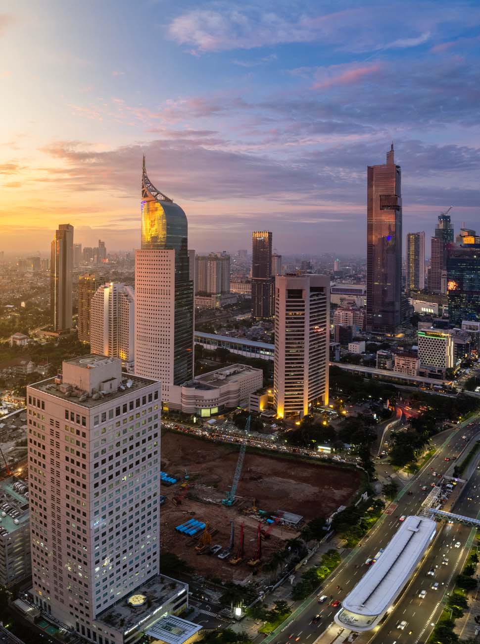 Photo shows Jakarta, Indonesia at sunset.