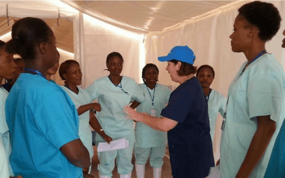 Daily briefing in the Aspen Medical-managed Hastings Airfield Ebola Treatment Centre, Freetown, Sierra Leone (circa 2014)