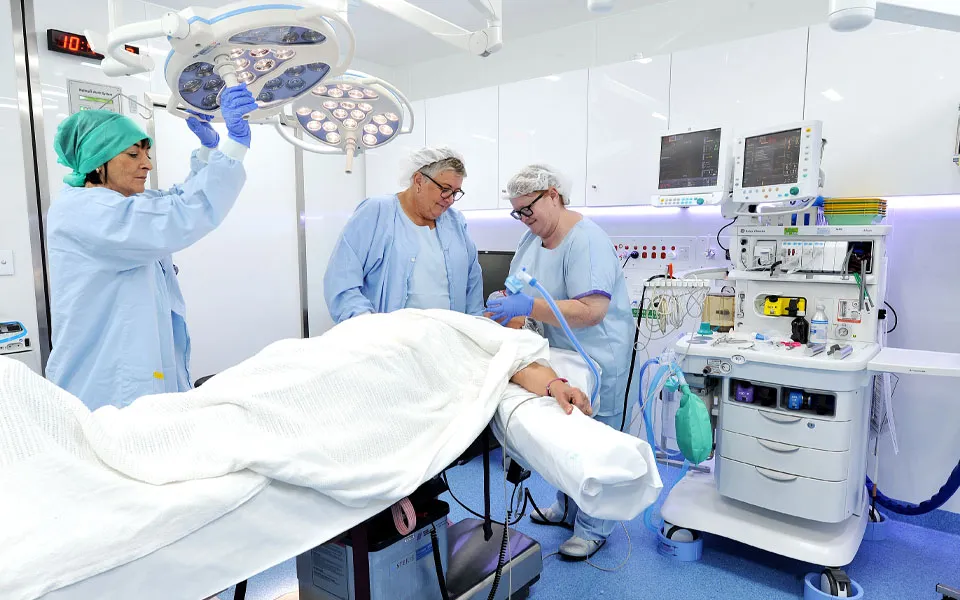 Photo of a surgery underway in Aspen Medical's mobile health unit.