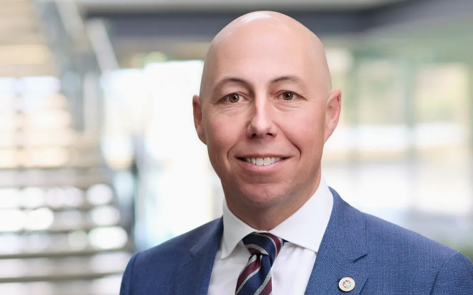 Head and shoulders corporate style photo of a man 