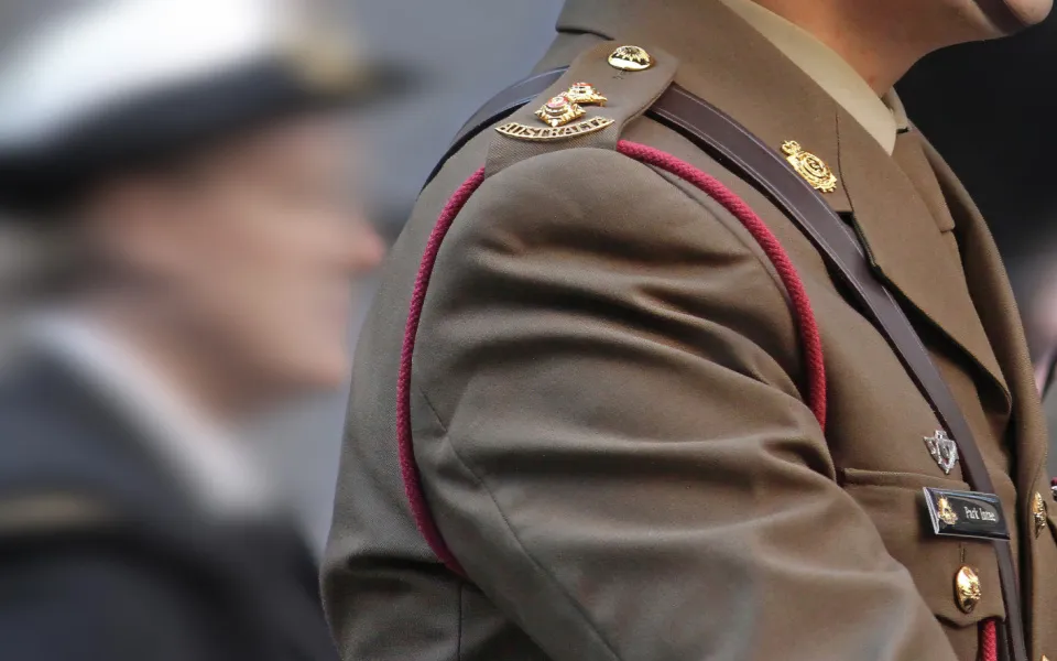 Defence personnel marching in uniform