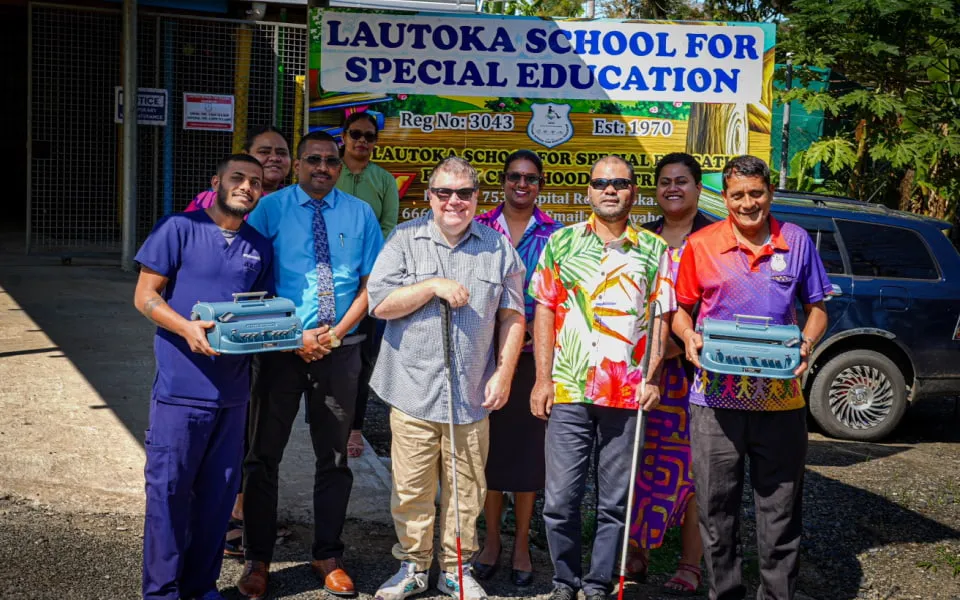 Ben Clare (front row, centre), Aspen Medical's Disability Inclusion Lead, with staff and students from Lautoka School for Special Education